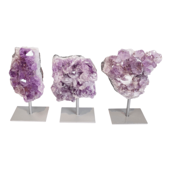 Amethyst cluster on grey metal stand