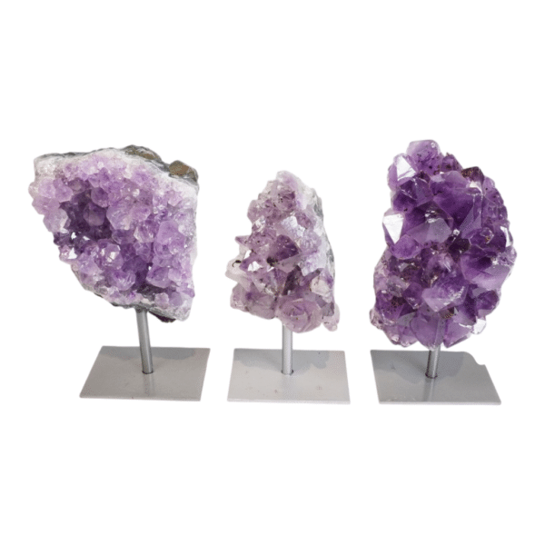 Amethyst cluster on grey metal stand
